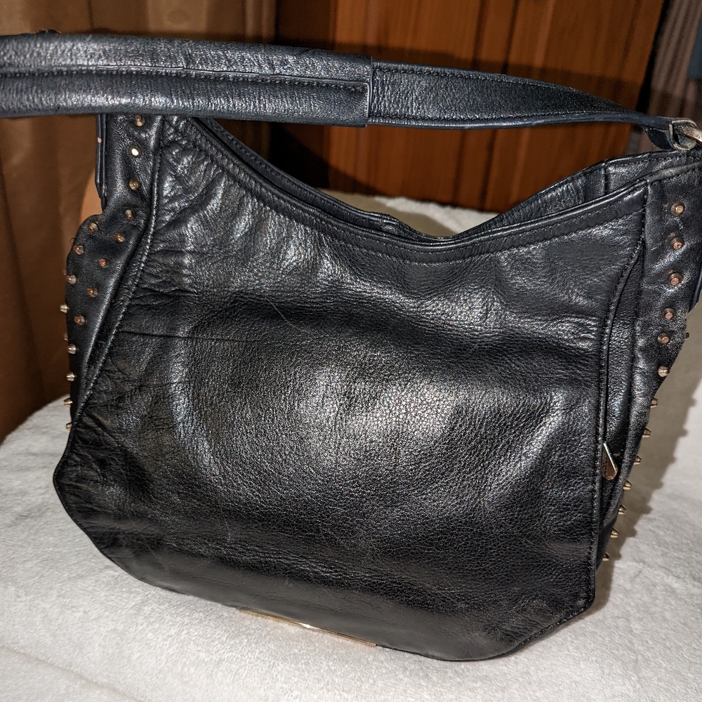 Rian black leather with studs shoulder bag.